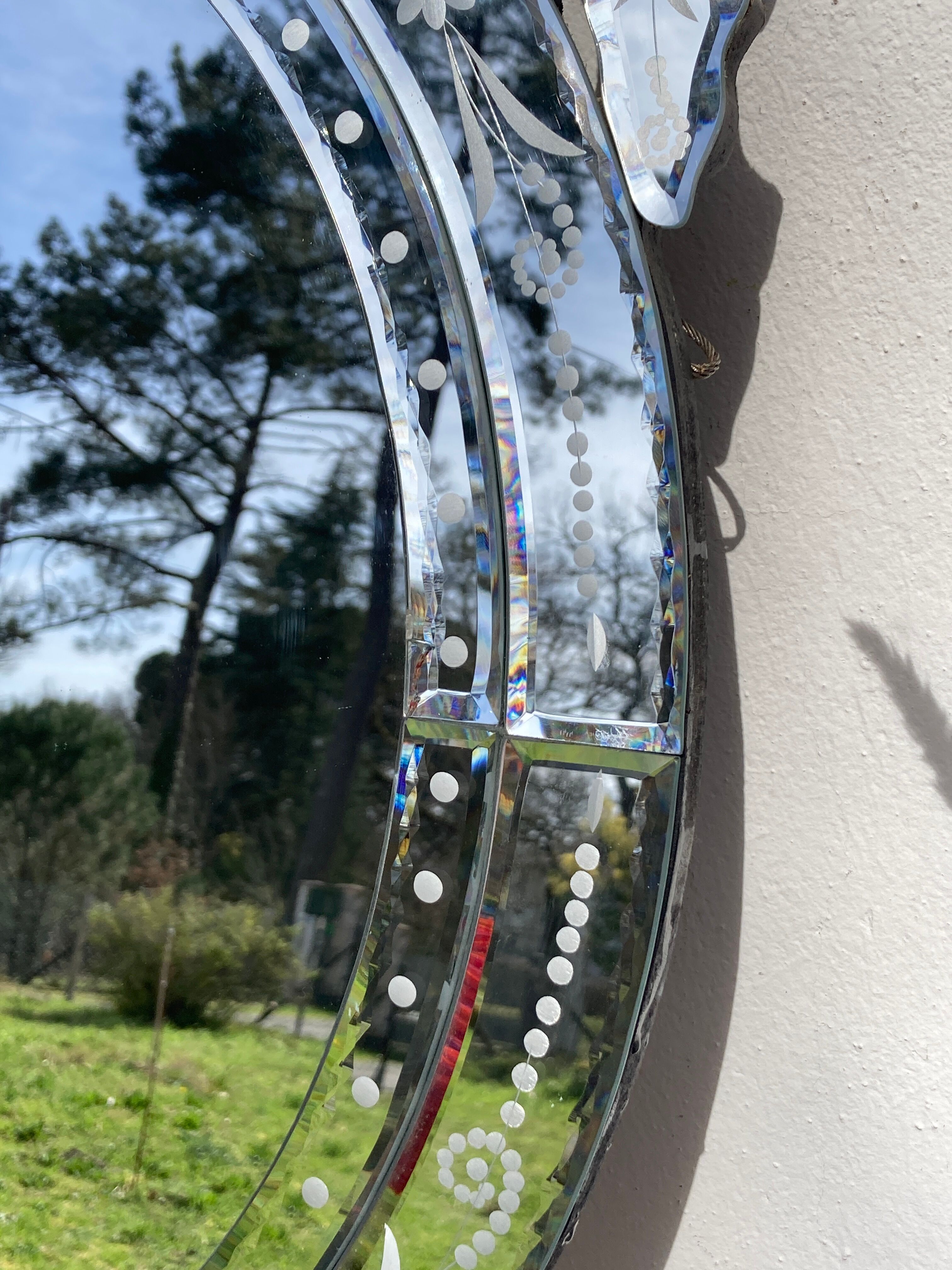 Oval Venetian wall mirror