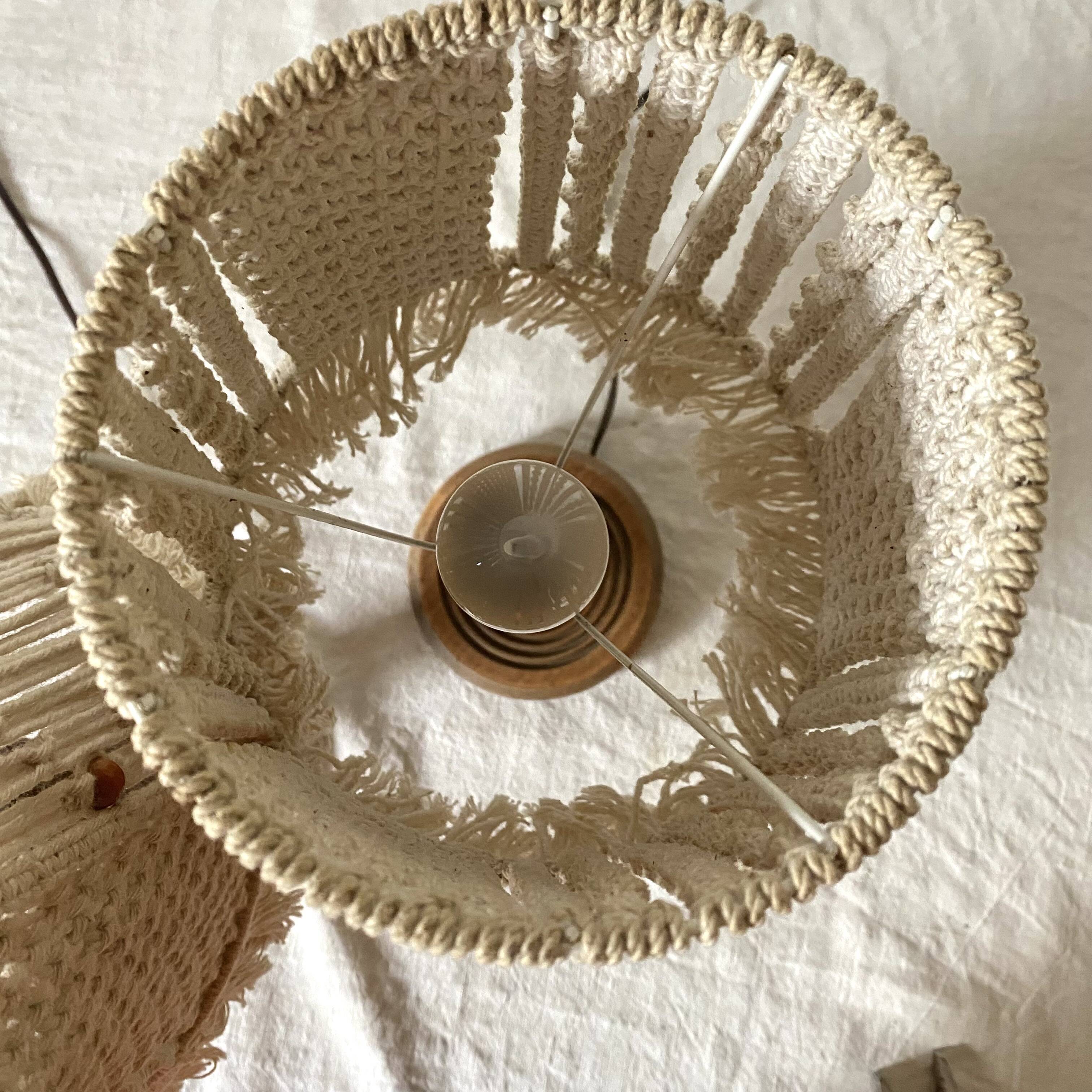 Pair of carved wood and macramé bedside lamps