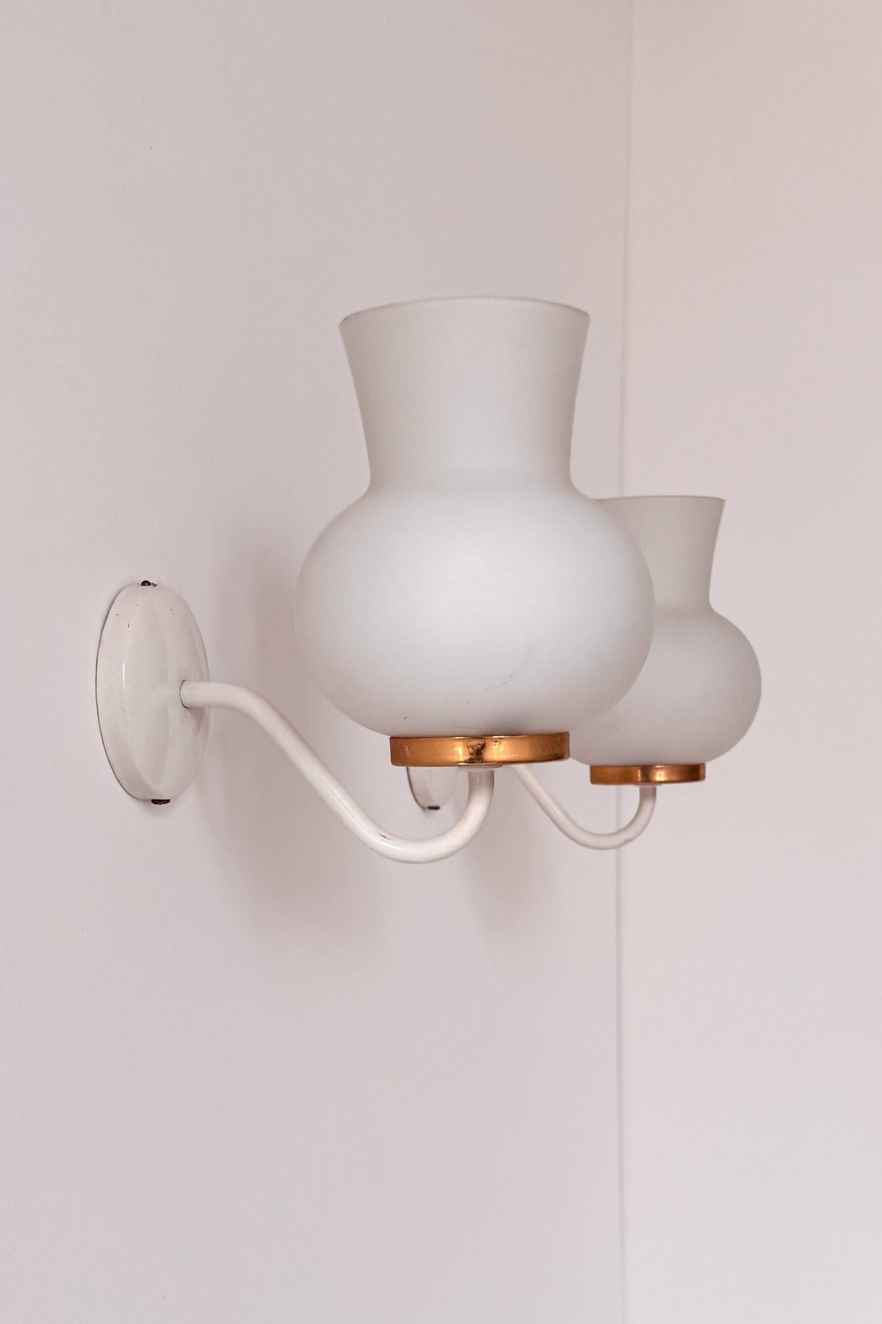 Pair of vintage wall lights in brass and opaline, France 1970.