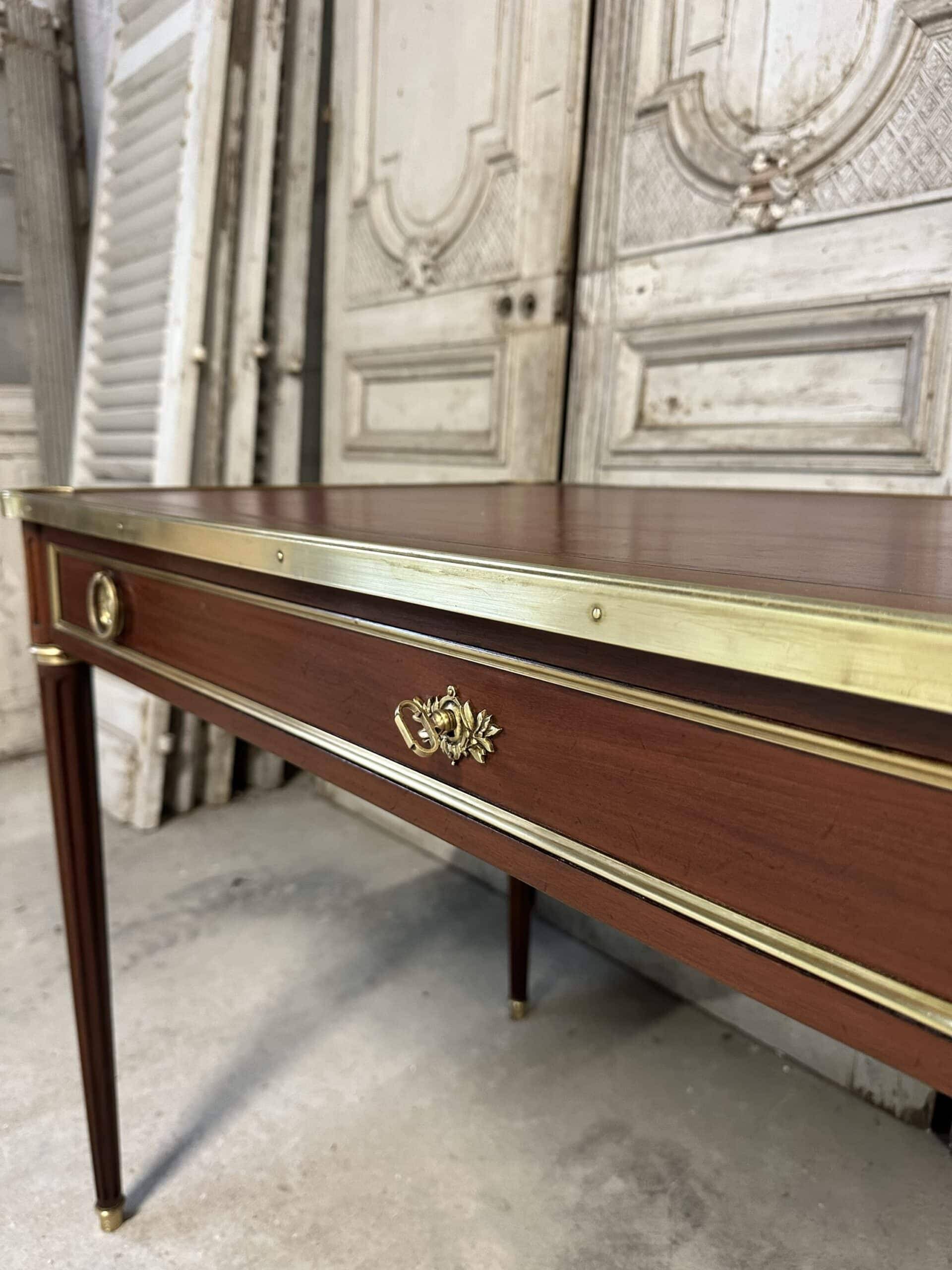 Louis XVI style flat desk in mahogany from around 1950.