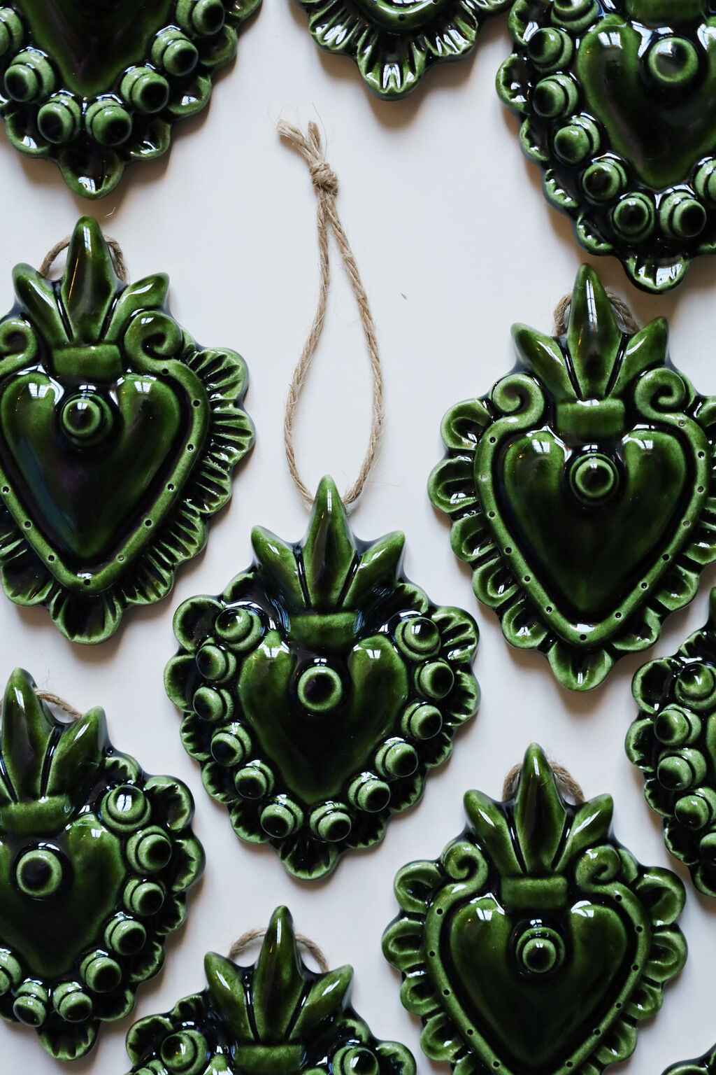 Decorative heart in green ceramic "pearls"