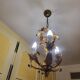 Set of 3 gold painted metal chandeliers
