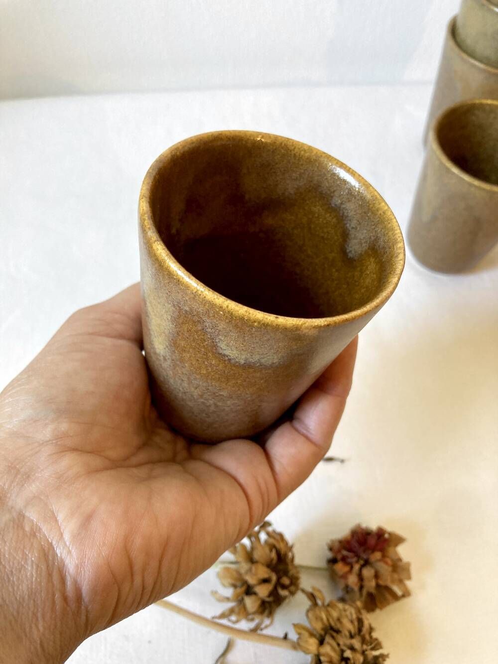 Set of 12 glazed stoneware cups, Digoin Stoneware Pots