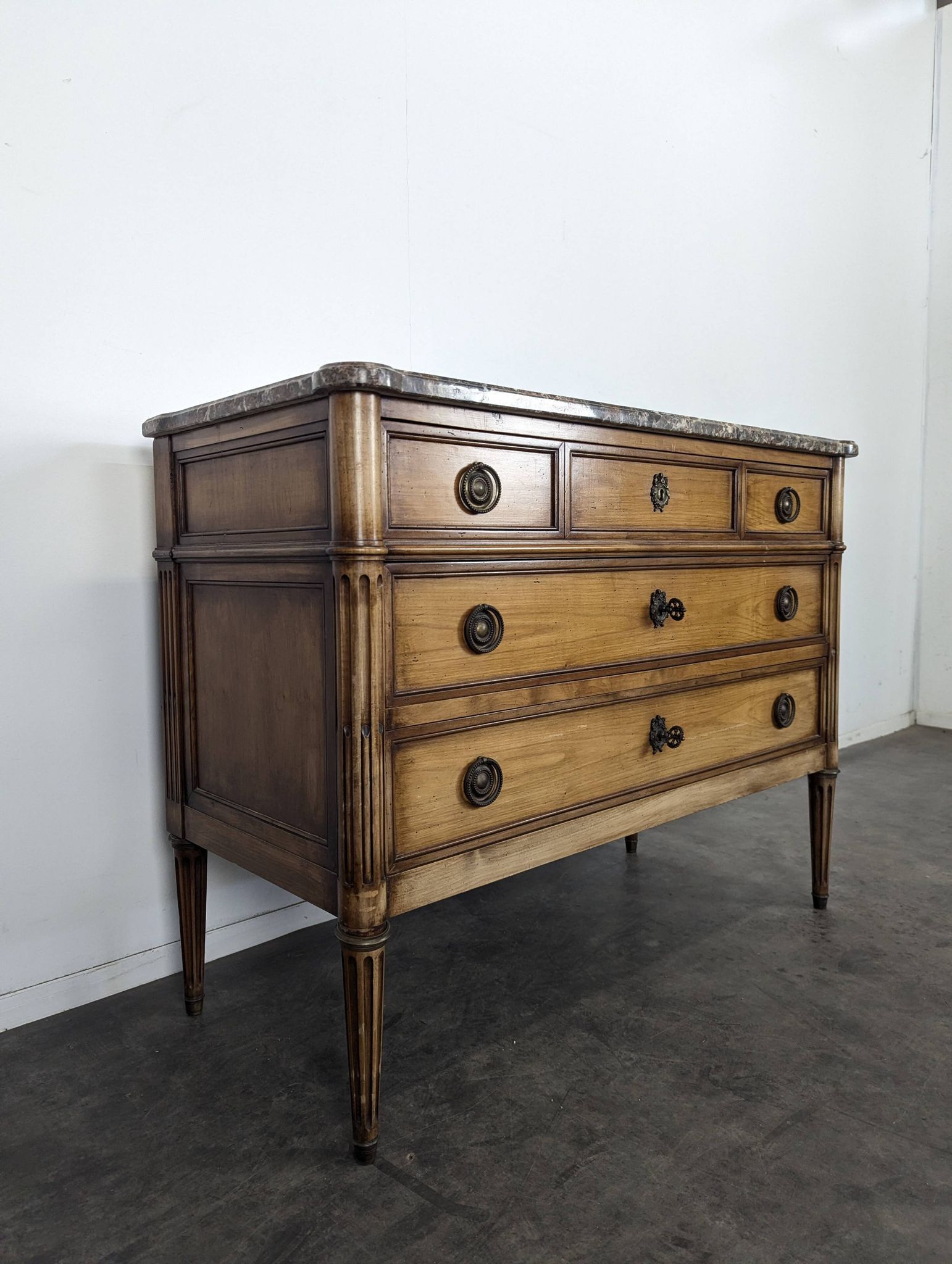 Louis XVI style chest of drawers in cherry wood with Pyrenean marble.