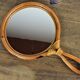 Rattan handle mirror