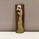 Slim relief with a motif of Madonna and child.