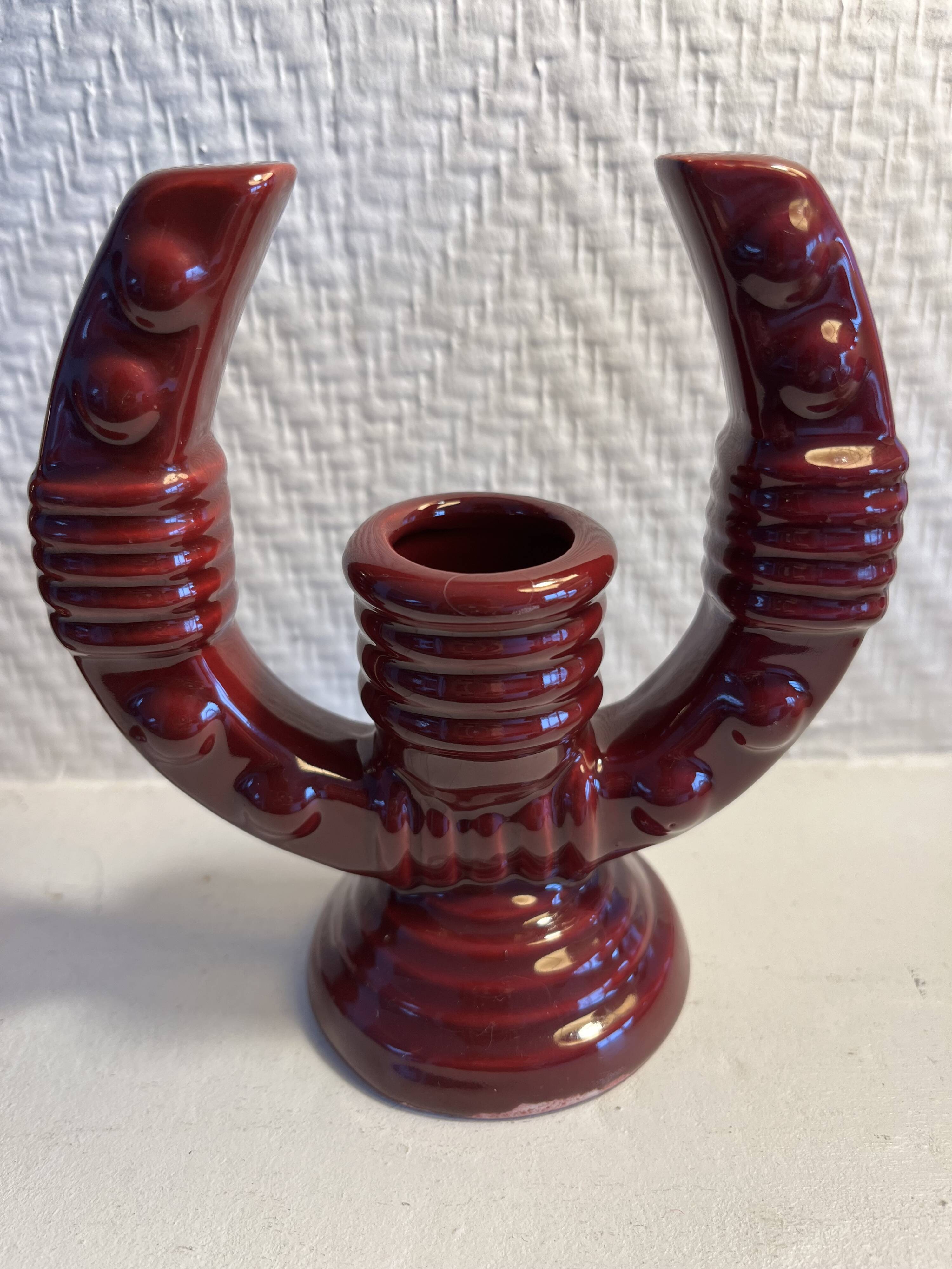 2 fifties red ceramic candle holders, horseshoe pattern