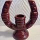 2 fifties red ceramic candle holders, horseshoe pattern