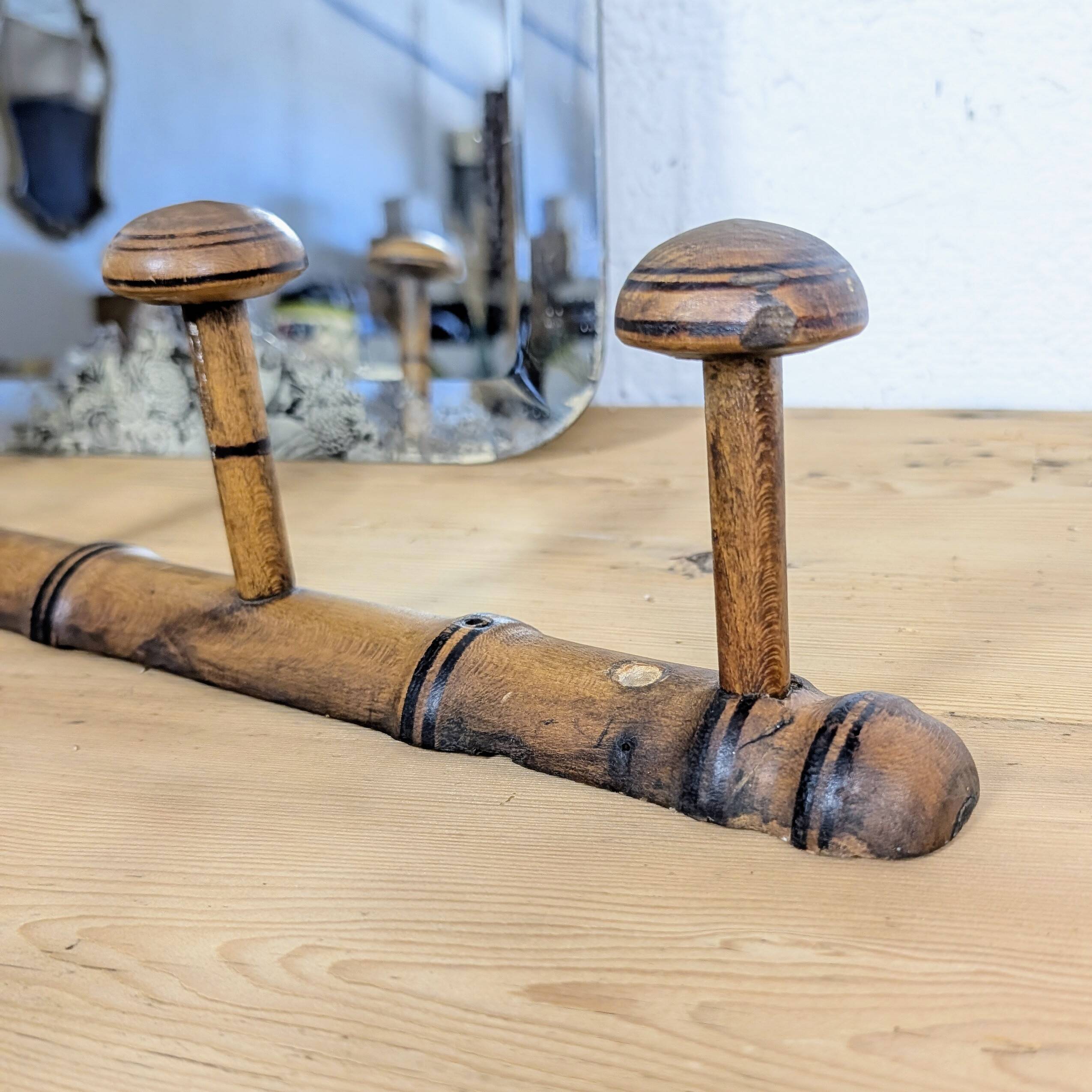 Turned wooden coat rack