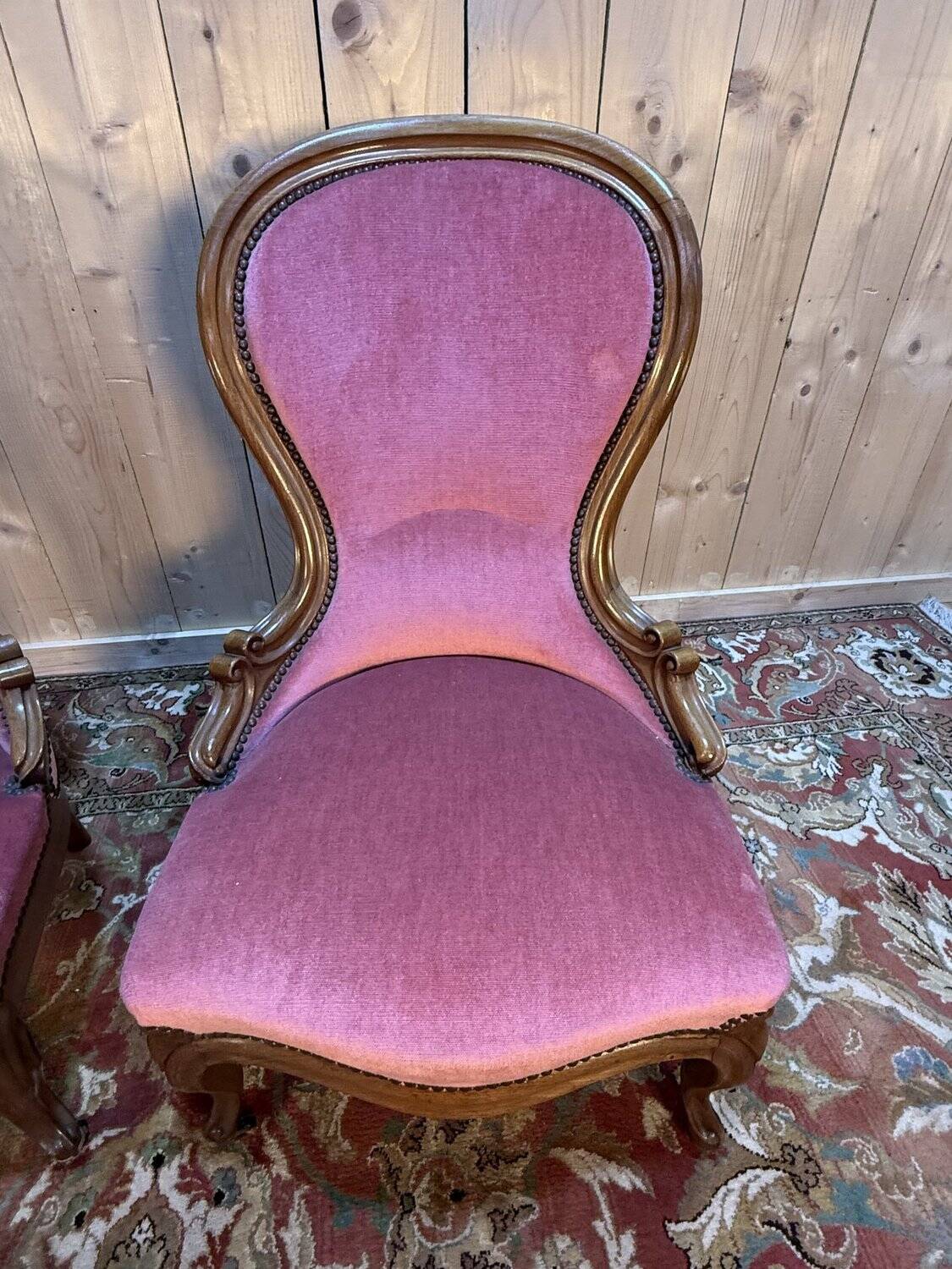 Pair of Louis Philippe armchairs in walnut and pink velvet.