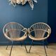 Paire de fauteuils corbeille en rotin - vers 1960.