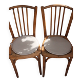 Duo of bistro chairs in bare wood, fully sanded and curved wooden backrest