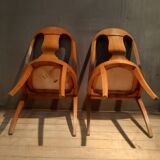 Pair of light wood gondola chairs