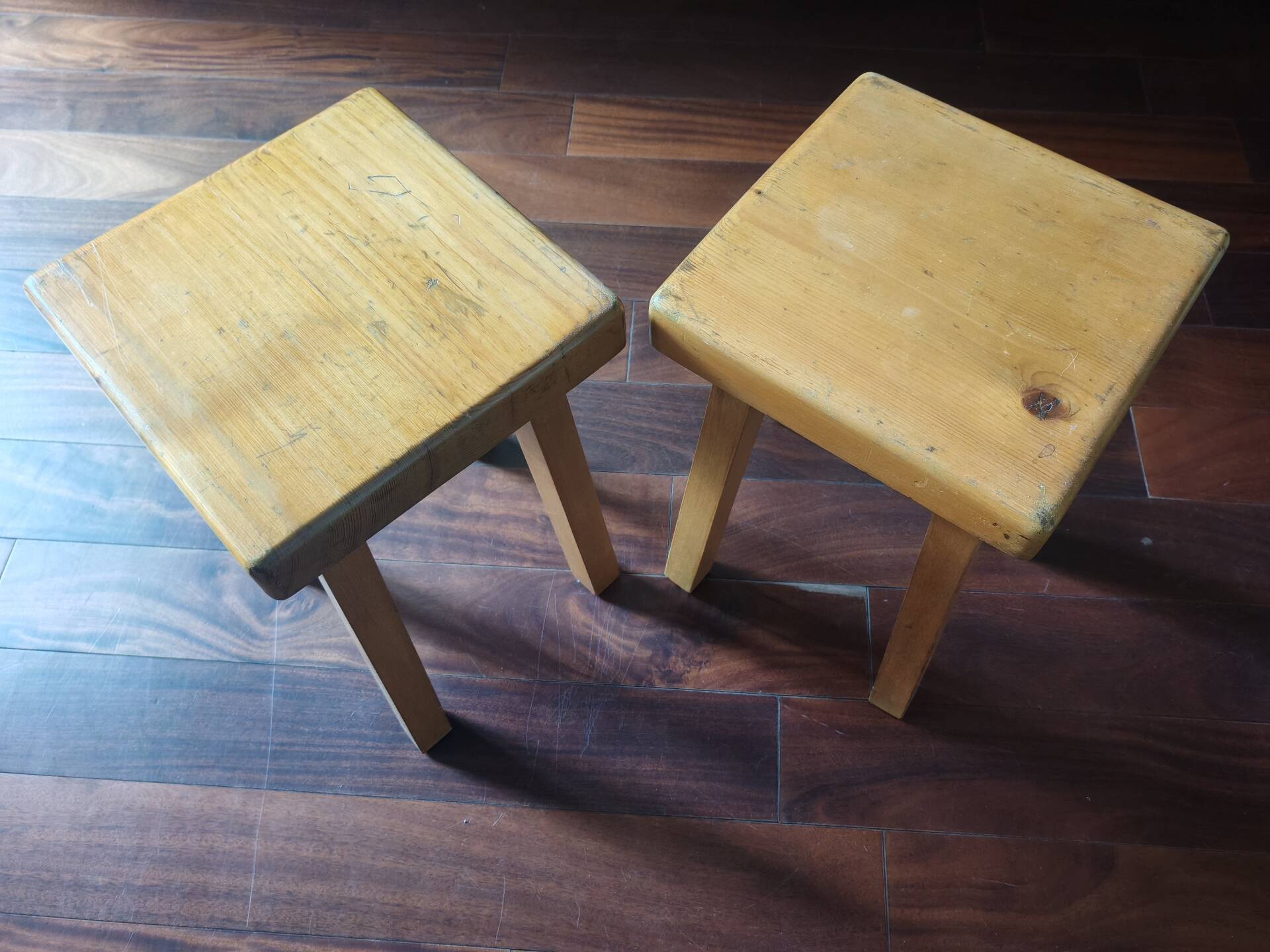 1 set of 2 solid pine stools by Charlotte Perriand, Les Arcs, France.