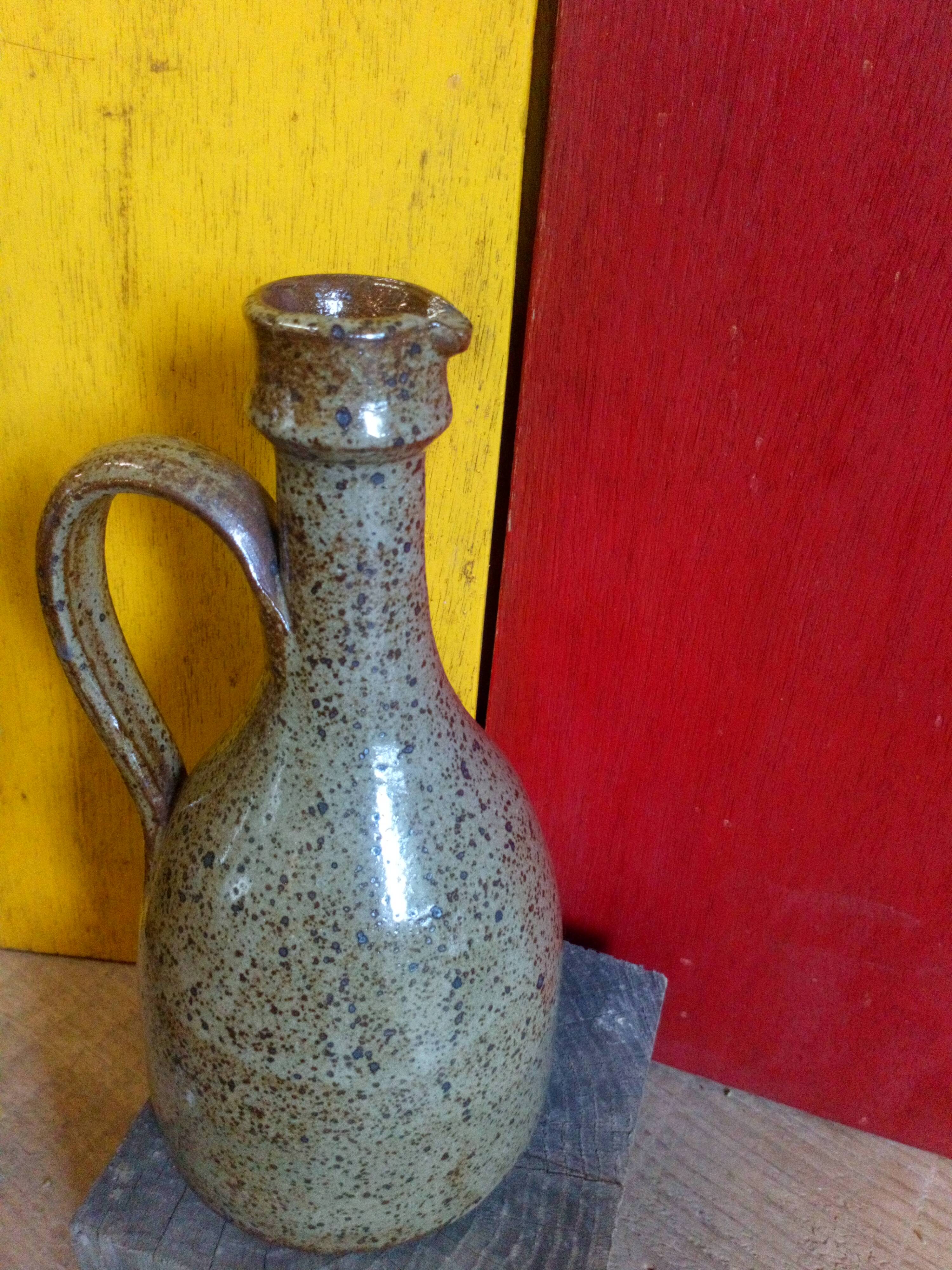 Vintage pottery in sandstone with handles and small beak
