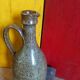 Vintage pottery in sandstone with handles and small beak
