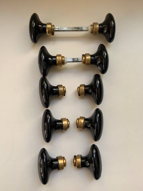 Black porcelain and brass handles