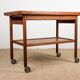 Danish extendable two-tiered teak serving trolley, 1960s, Kurt Ostervig.