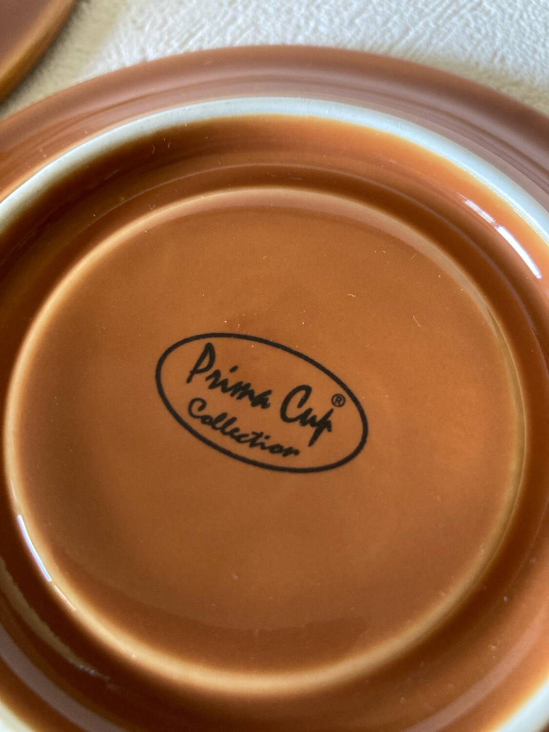 Caramel-colored bistro coffee cups and saucers