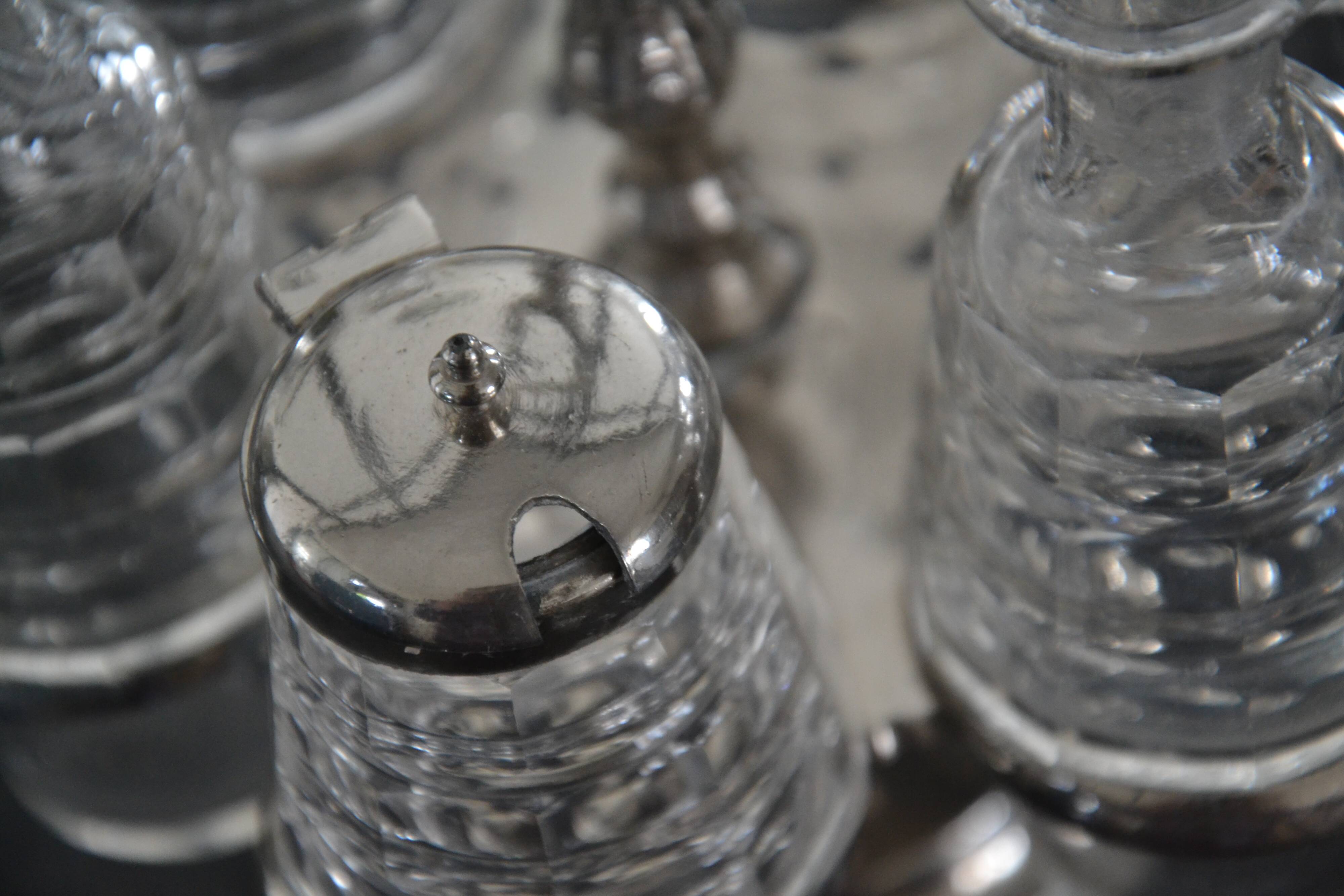 Silver-plated oil and pepper server in Art Deco style.