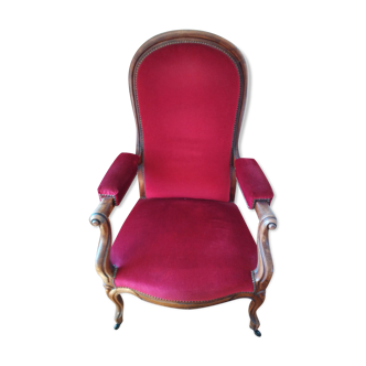 Fauteuil d'époque avec son repose pieds assorti