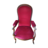 Armchair with its matching footrest