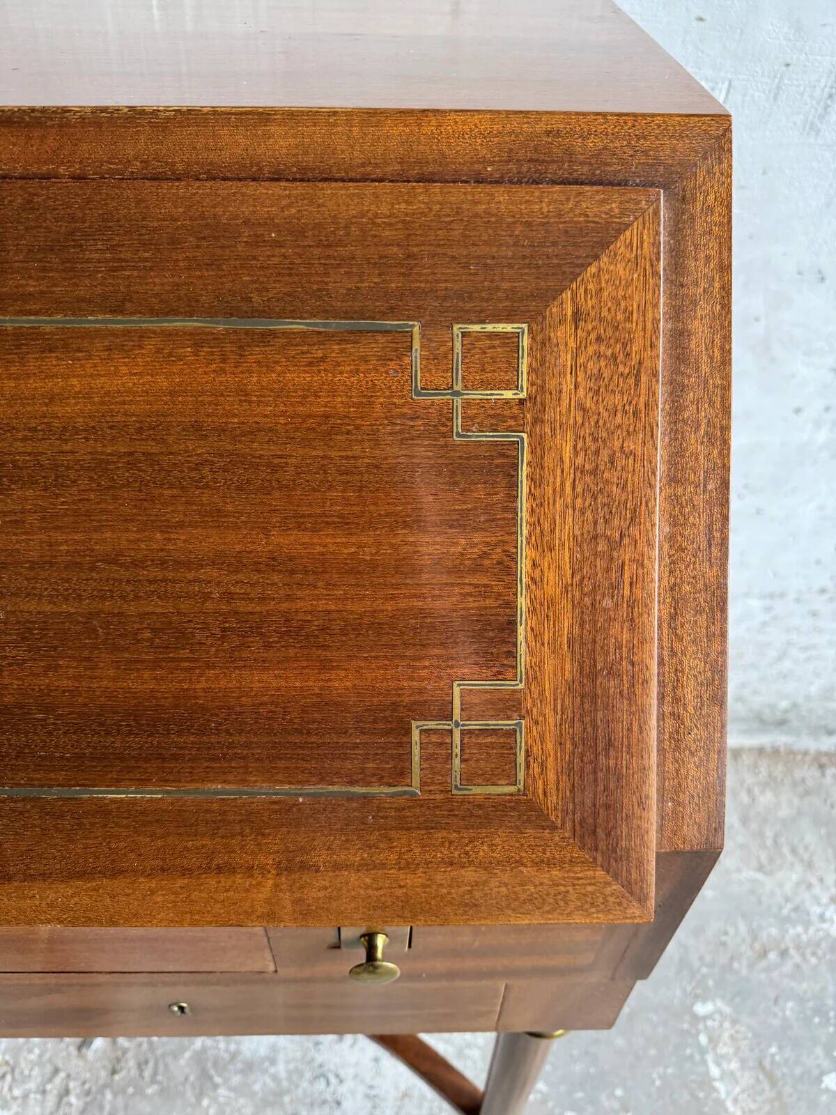 DeCoene antique wood writing desk with beige striped upholstered chair, brass-accented classic set