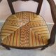 Wooden armchair with straw seat