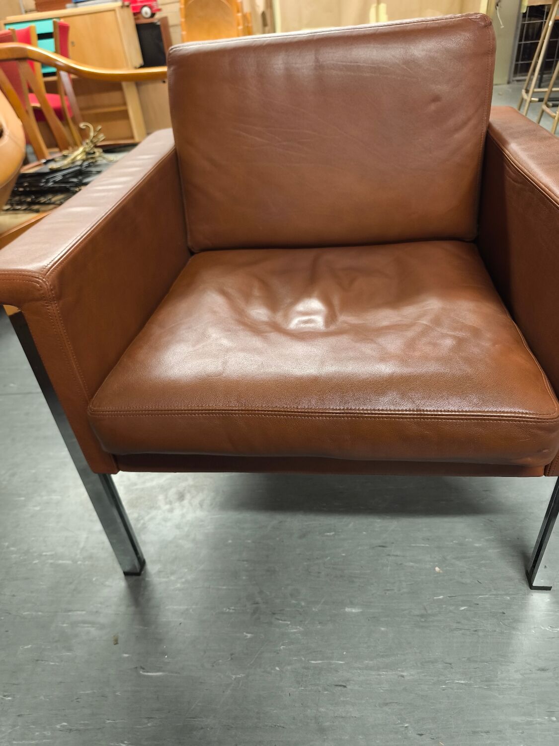 Leather armchair, 1970s, manufacturer Sitag, cognac brown leather.