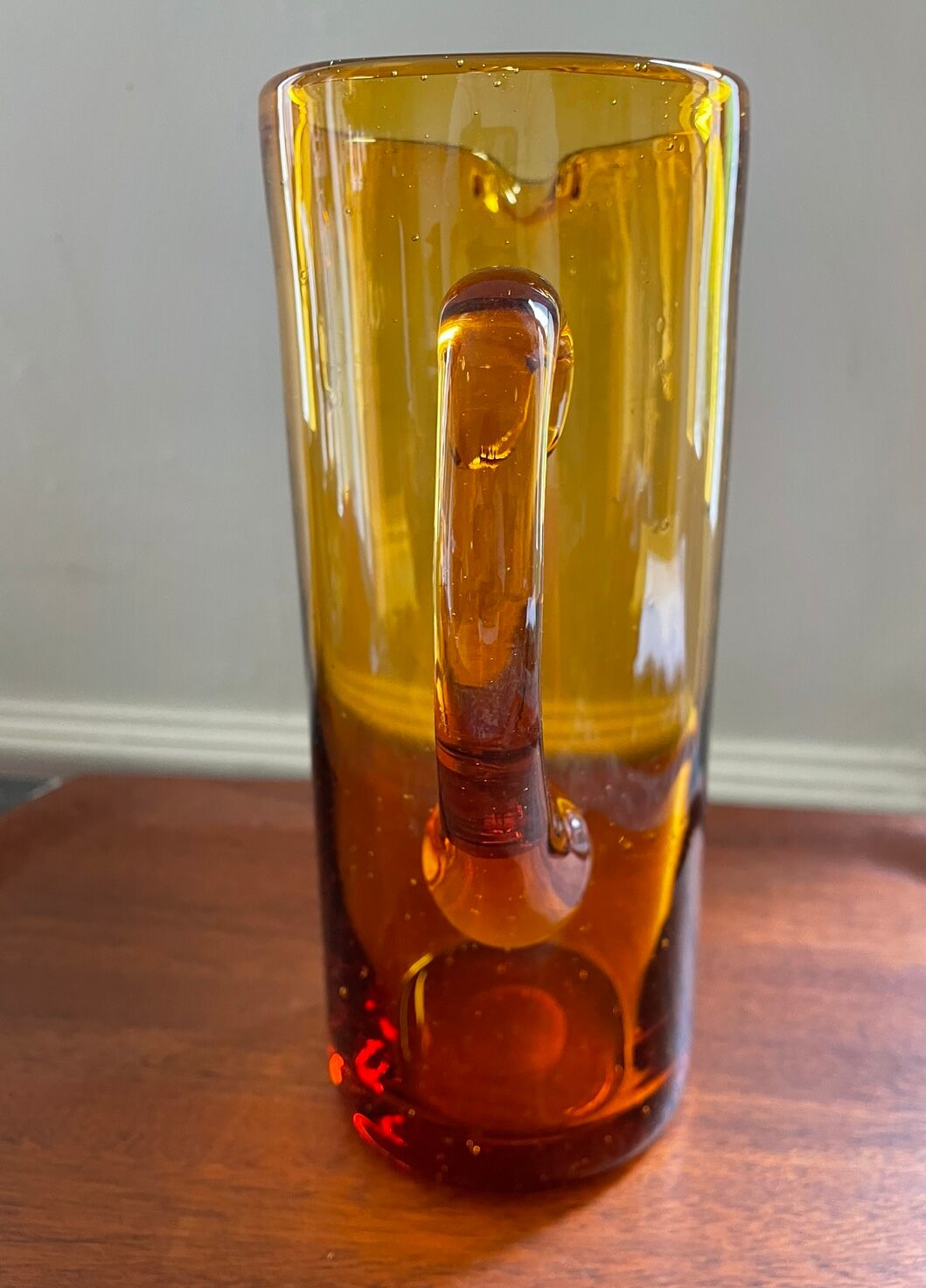 Amber pitcher bubbled glass