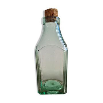 Green blown glass bottle