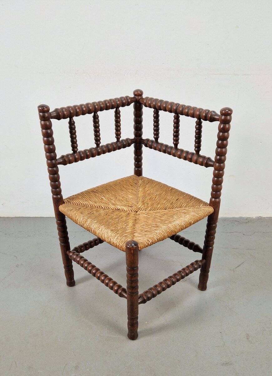 Corner chair in Arts and Crafts style made of oak with a rush seat, 1950s.