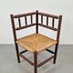 Corner chair in Arts and Crafts style made of oak with a rush seat, 1950s.