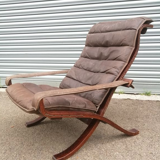 Leather siesta chair by Ingmar Relling and rests foot