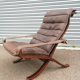 Leather siesta chair by Ingmar Relling and rests foot