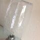 Pair of vintage 1970s-80s glass and chrome wall lights with teardrop shapes