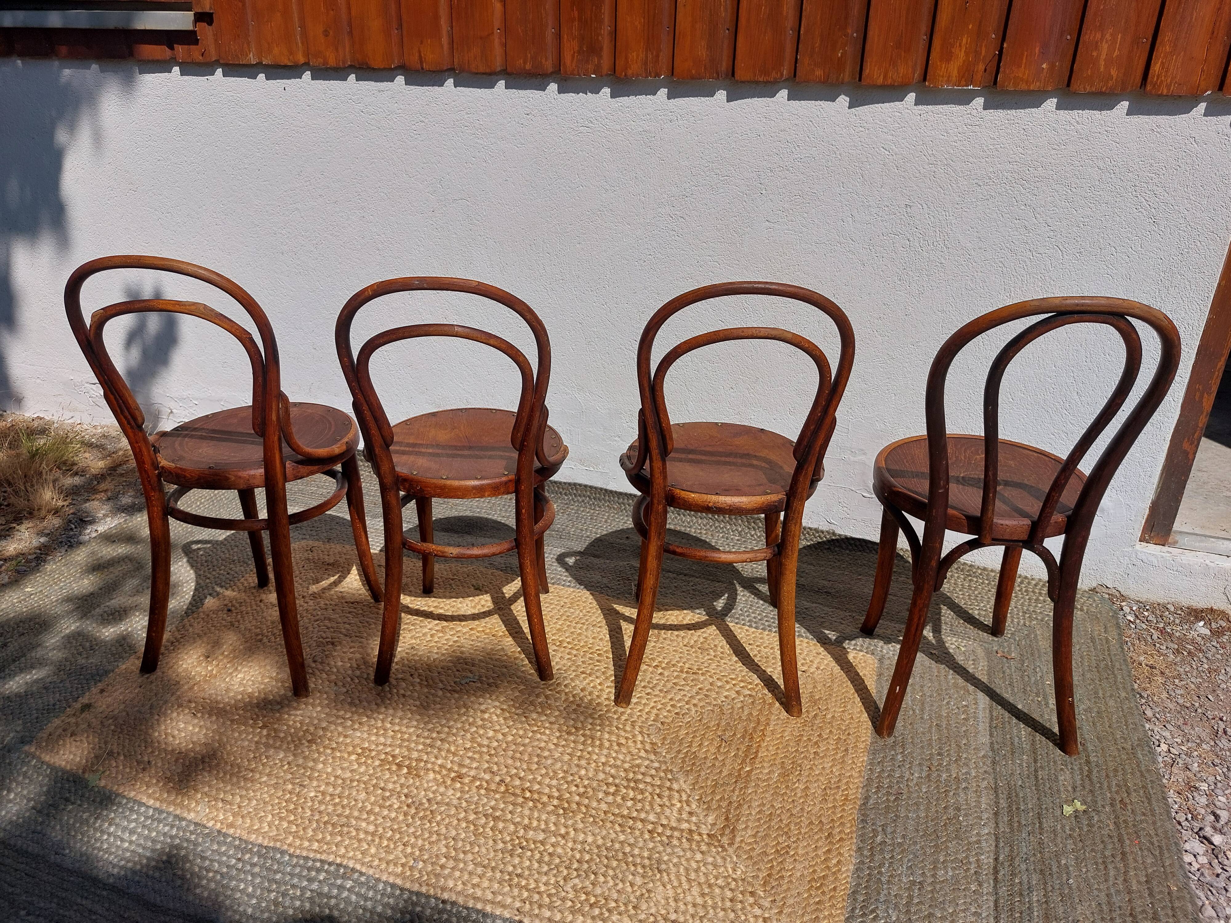 4 curved wooden bistro chairs