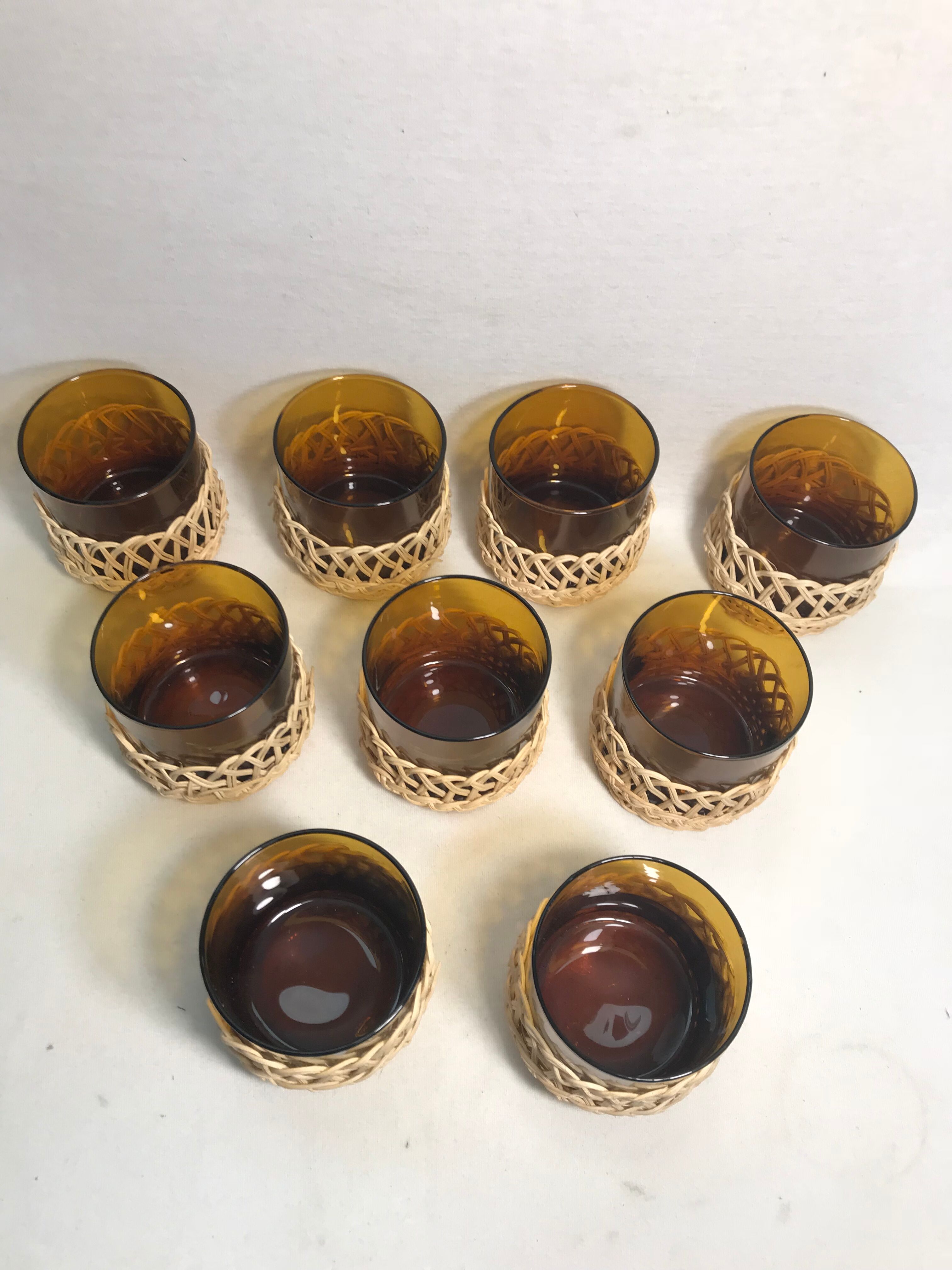 Service old juice carafe and its 9 orange glasses