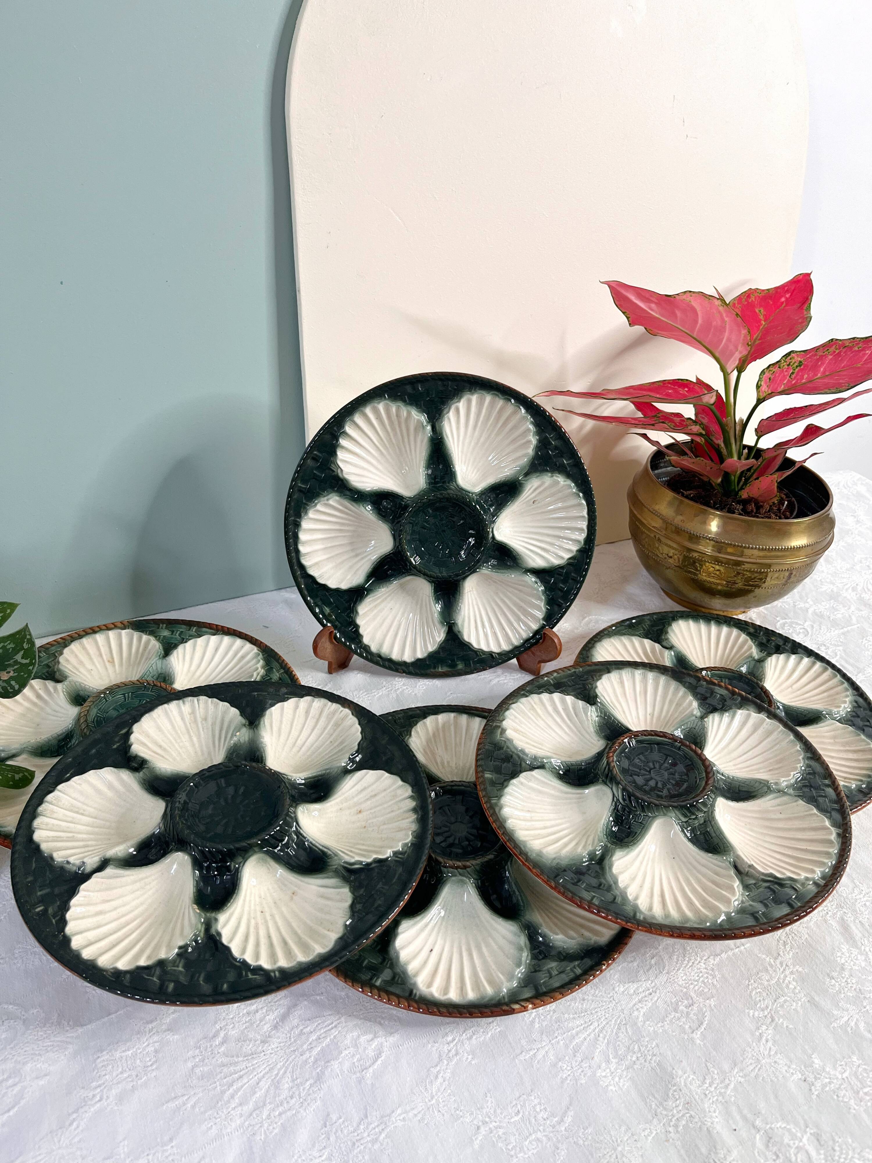 Green and white slip oyster plates