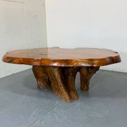 Brutalist Wabi Sabi mid-century coffee table made of natural biological burl wood.