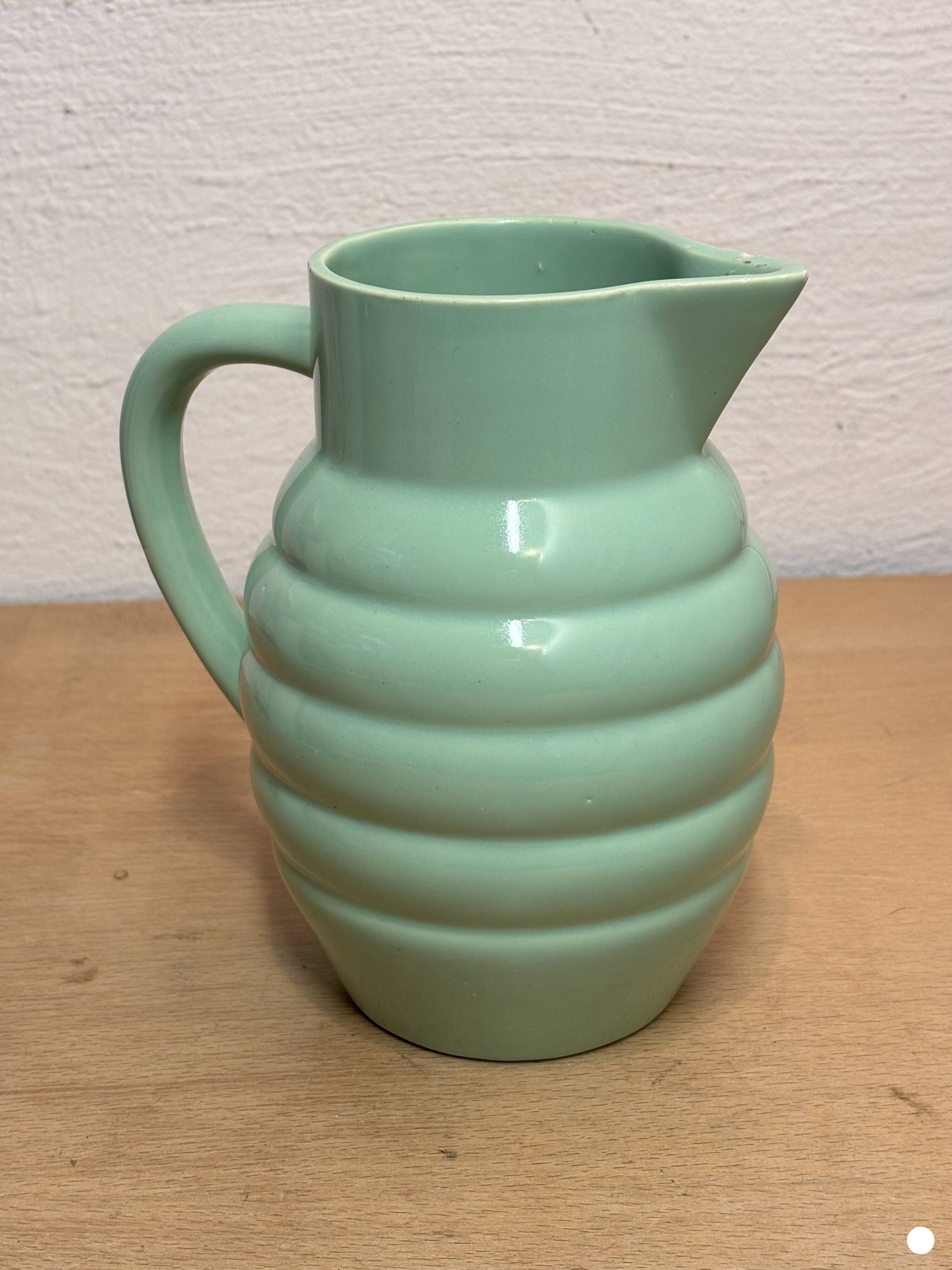 Green earthenware pitcher