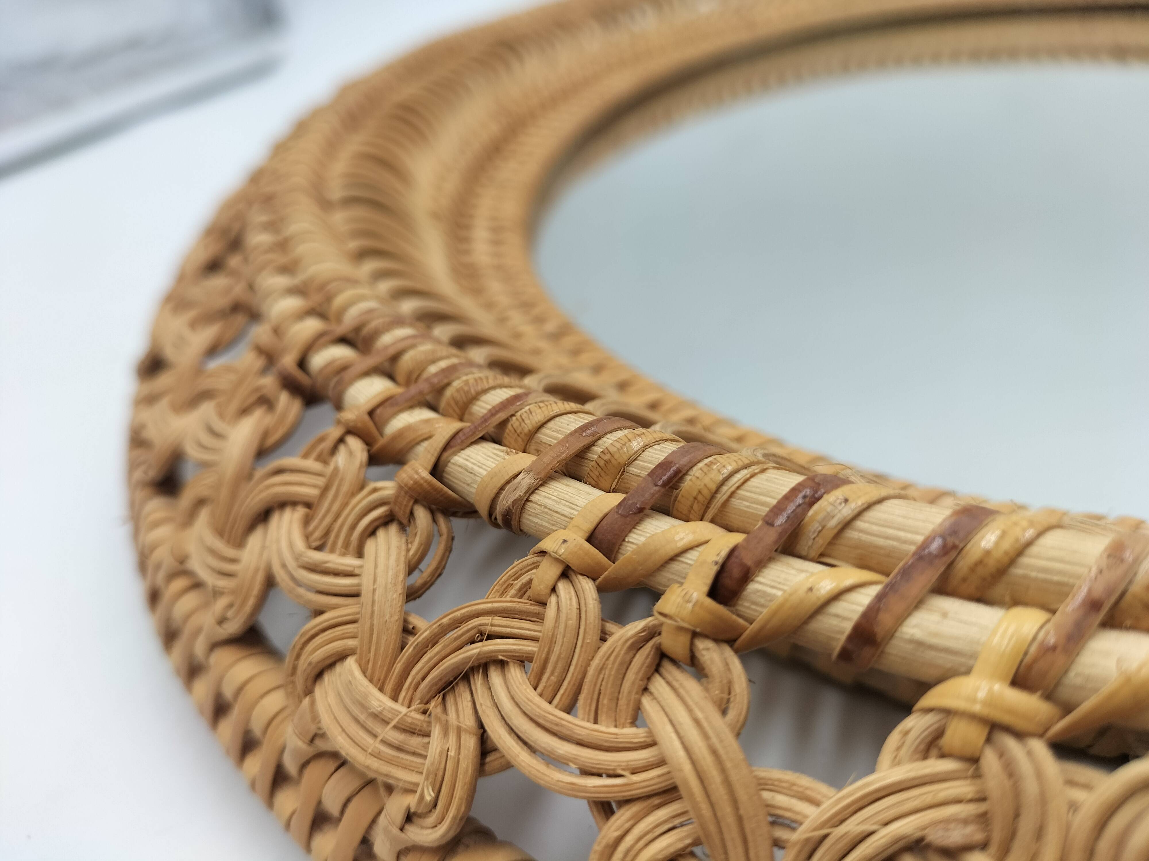 Oval rattan mirror