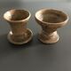 Set of 2 stoneware candle holders.