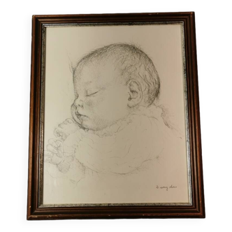 frame with printed drawing by Danish artist Il Spang Olsen of an adorable baby taking a nap