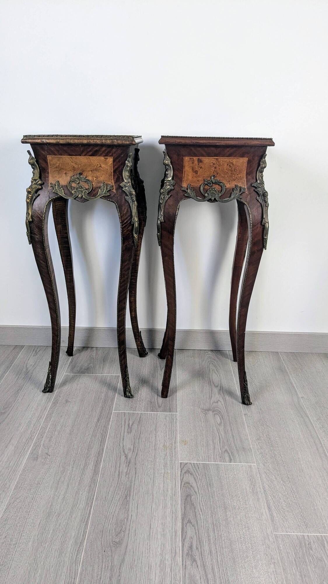 Pair of Louis XV bedside tables with marquetry and gilded bronzes