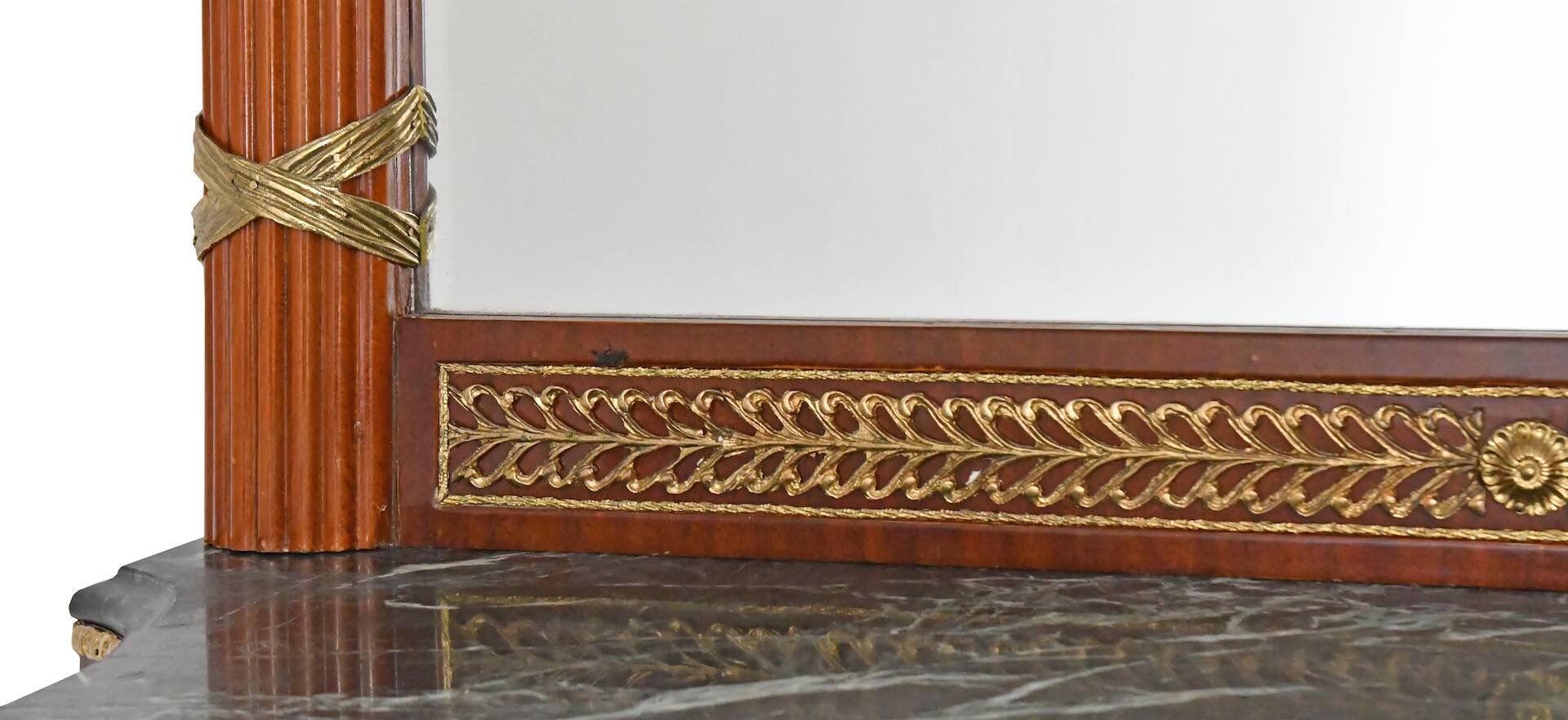 Console topped with an Empire-style mirror.
