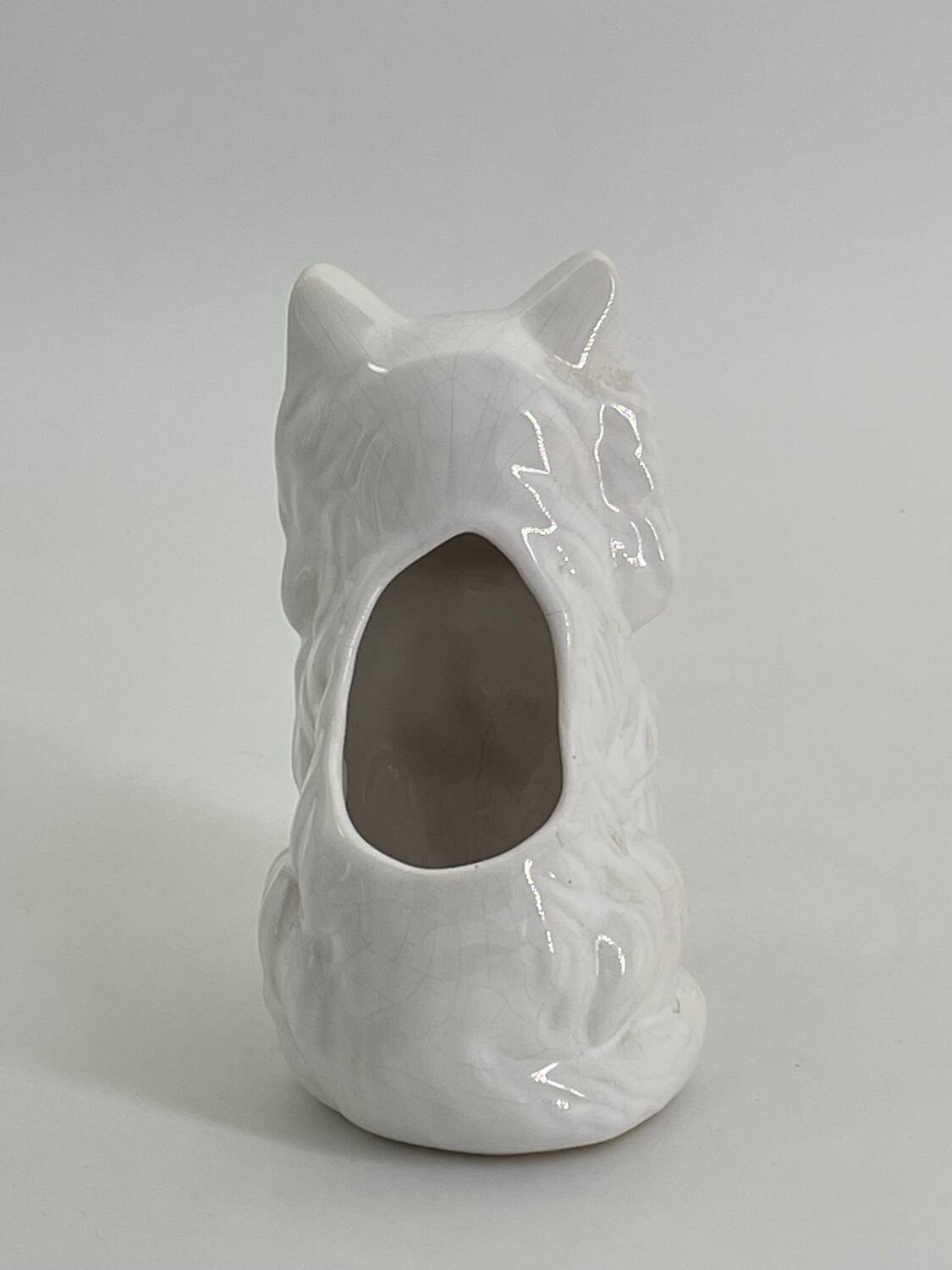 Vintage ceramic pot holder in the shape of a cat