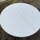 White dining table with a central tulip base, extendable to 100cm.