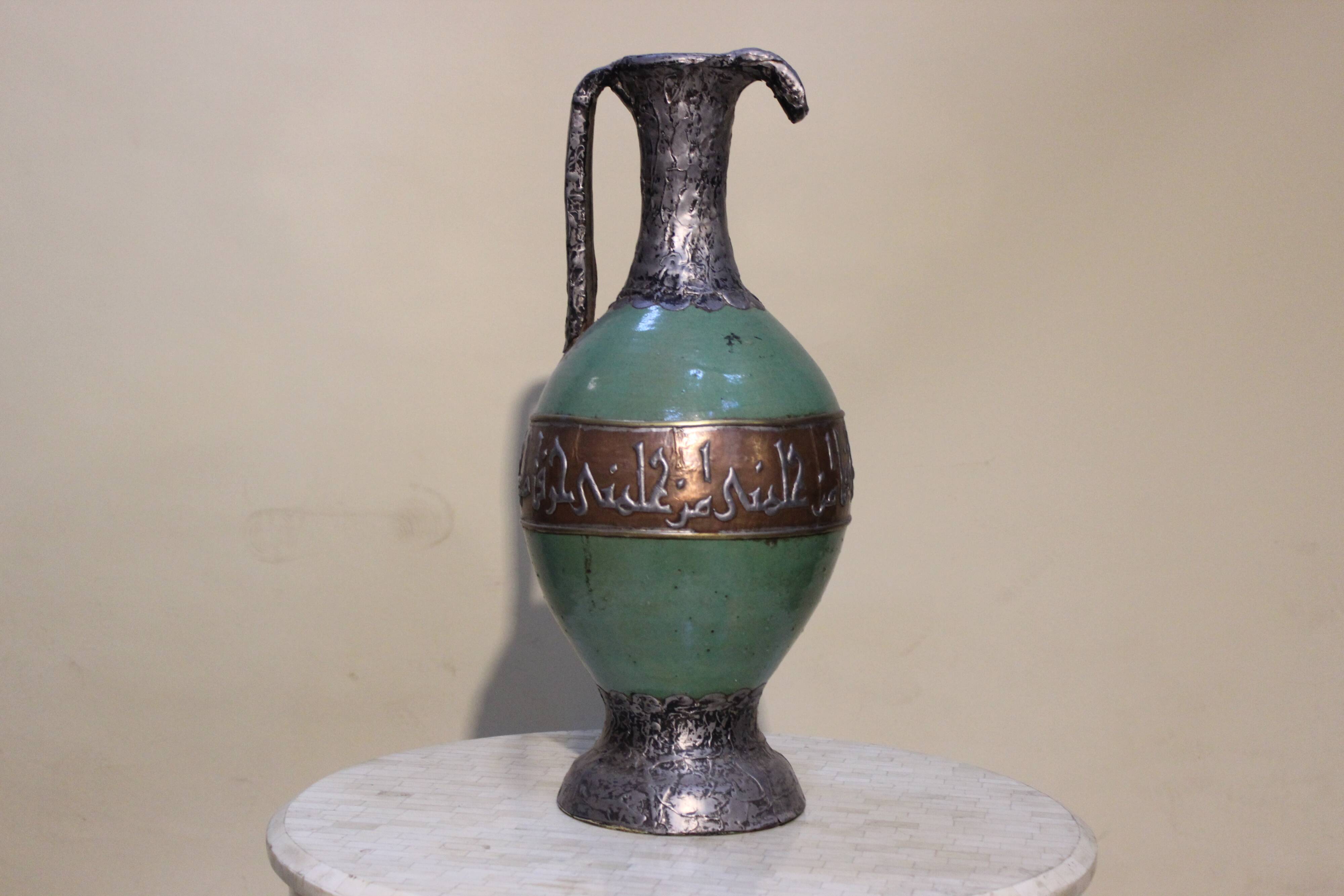 Vase en poterie tamgroute