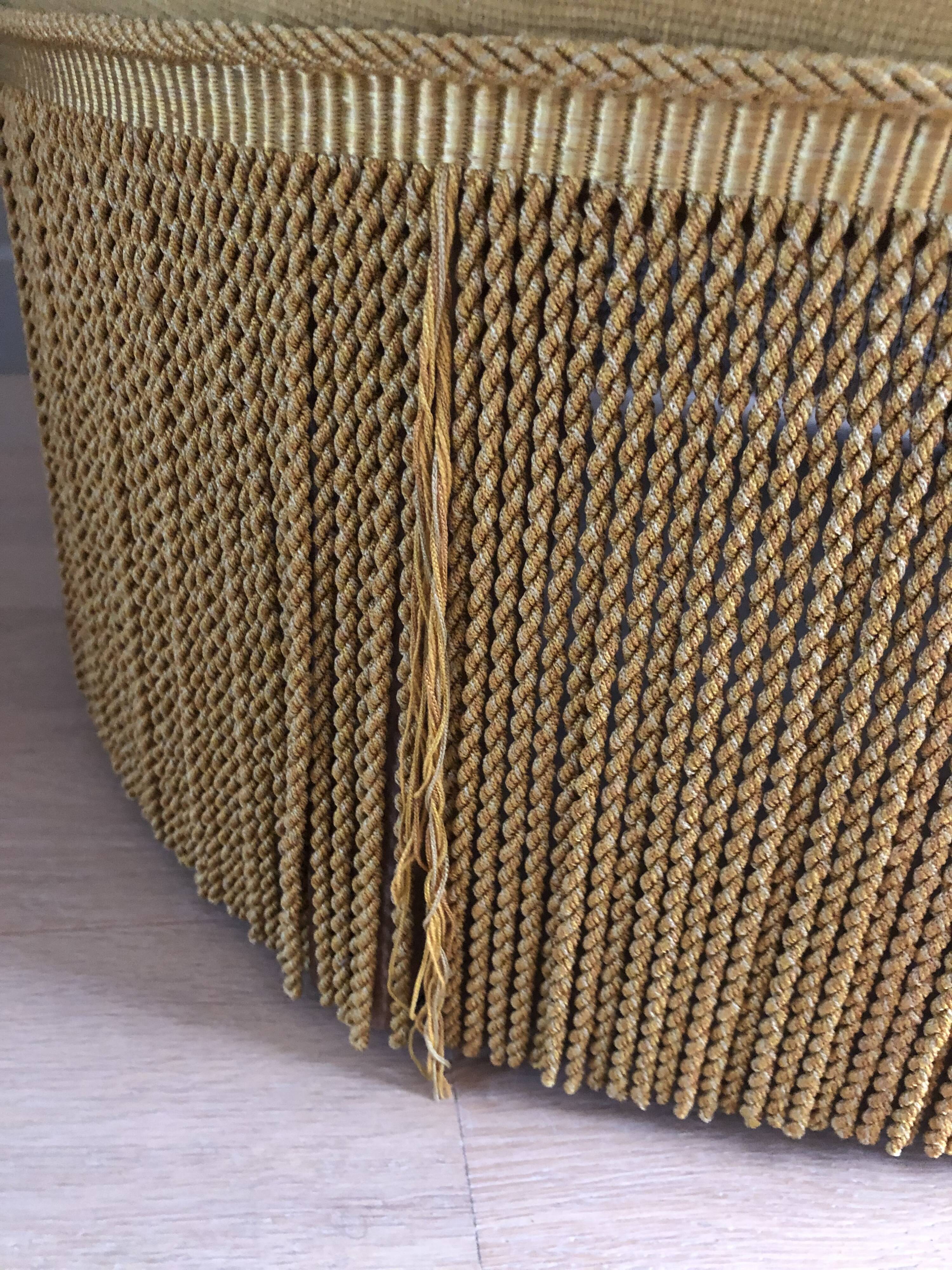 Fauteuil crapaud à franges vintage